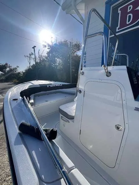 Slide: The Image of Parker 21 SE CC 2025 boat in sunlight, showcasing sleek design and modern features. - 8