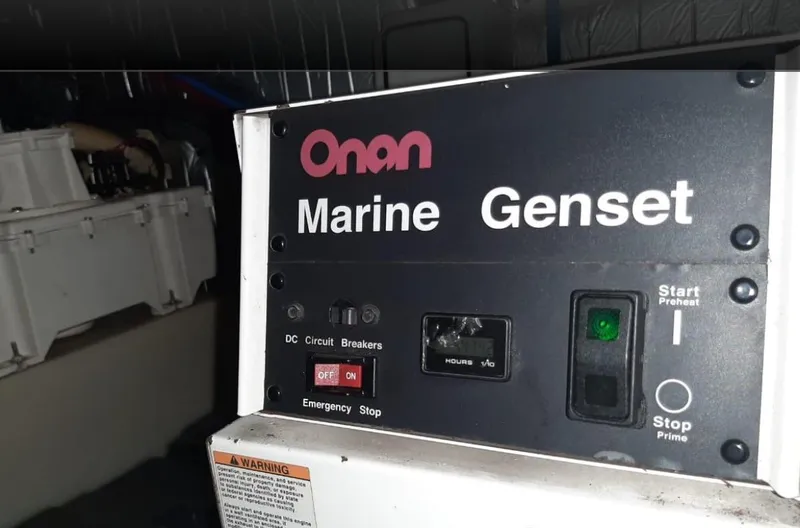 Slide: The Image of Onan Marine Genset in 2009 Riviera 47 Enclosed Flybridge Series II yacht. - 18