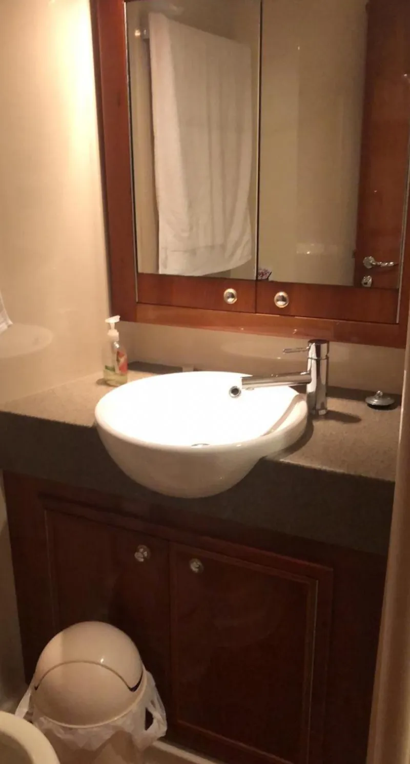 Slide: The Image of Bathroom interior of 2009 Riviera 47 Enclosed Flybridge Series II yacht. - 20