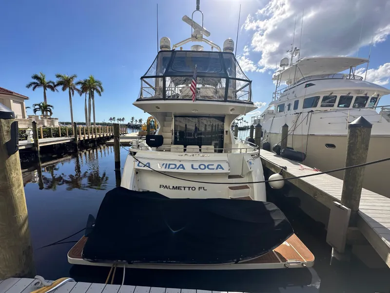 Slide: The Image of 2004 Marquis 59 yacht docked in sunny marina, Palmetto, Florida. - 3