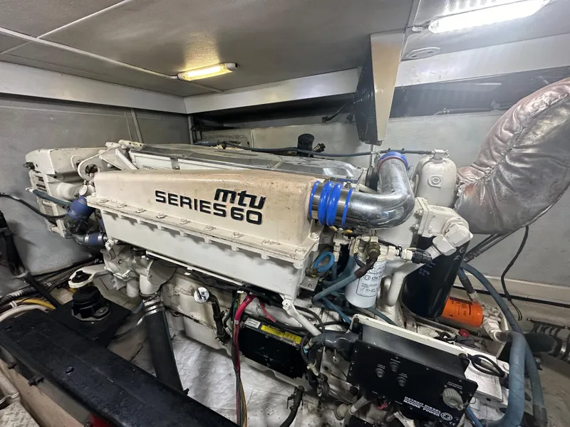 Slide: The Image of MTU Series 60 engine in a 2004 Marquis 59 yacht engine room. - 37