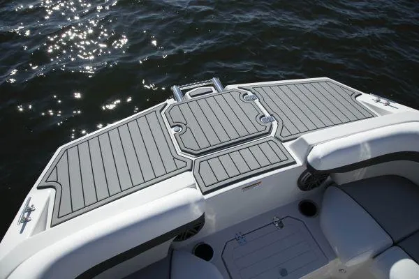 Slide: The Image of 2025 Starcraft SVX 190 OB boat deck with sleek design on water. - 5
