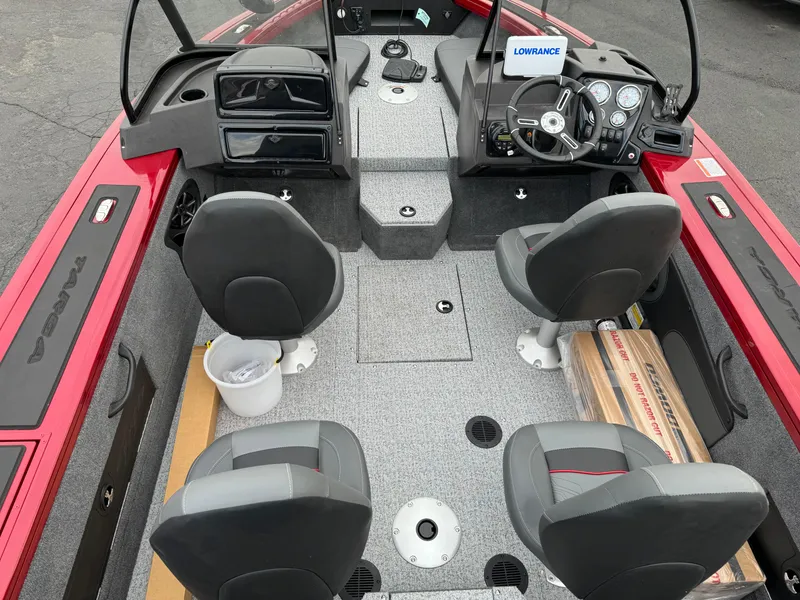 Slide: The Image of 2024 Tracker Targa V-18 Combo boat interior with seating and dashboard. - 19