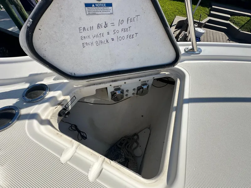 Slide: The Image of Open hatch on 2005 Tiara Yachts 3600 Sovran with rope length instructions. - 10