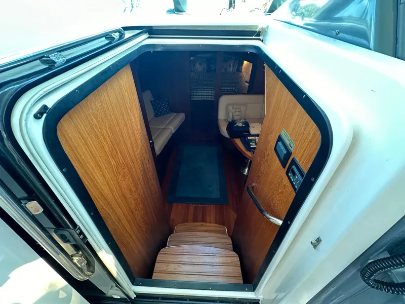 Slide: The Image of Interior view of 2005 Tiara Yachts 3600 Sovran cabin with wooden finishes. - 37
