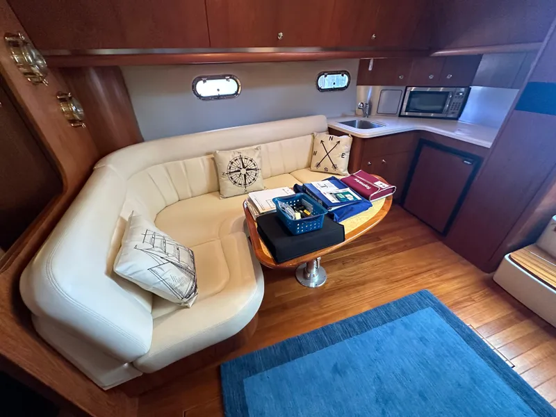 Slide: The Image of Luxurious 2005 Tiara Yachts 3600 Sovran interior with cozy seating and modern amenities. - 40