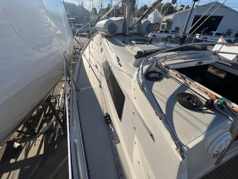 Slide: The Image of 1983 O'Day 34 sailboat deck view with rigging and equipment. - 17
