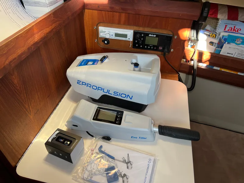 Slide: The Image of Epropulsion Evo Tiller on 1983 O'Day 34 sailboat interior table. - 27