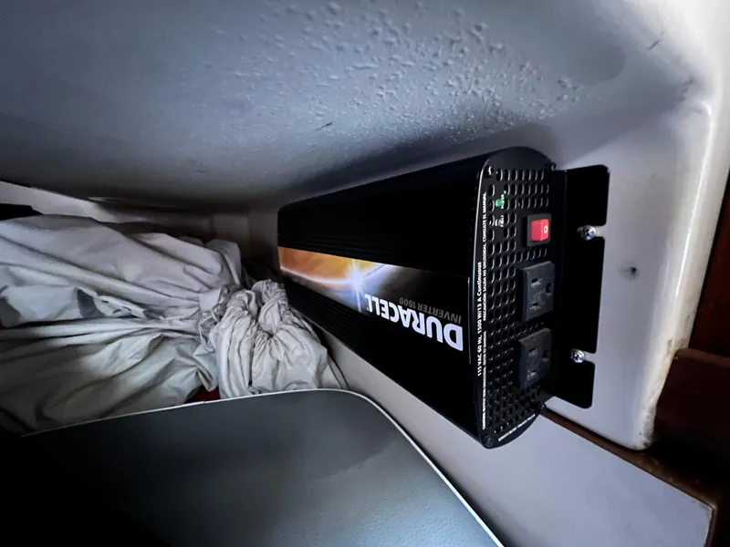 Slide: The Image of Duracell power inverter installed in 1983 O'Day 34 sailboat interior. - 38