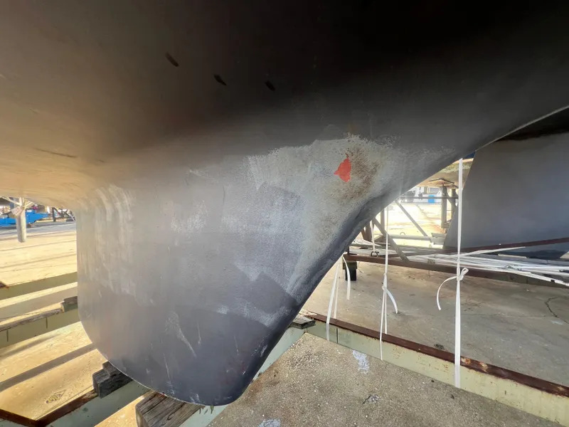 Slide: The Image of Close-up of 1983 O'Day 34 sailboat hull on dry dock. - 45