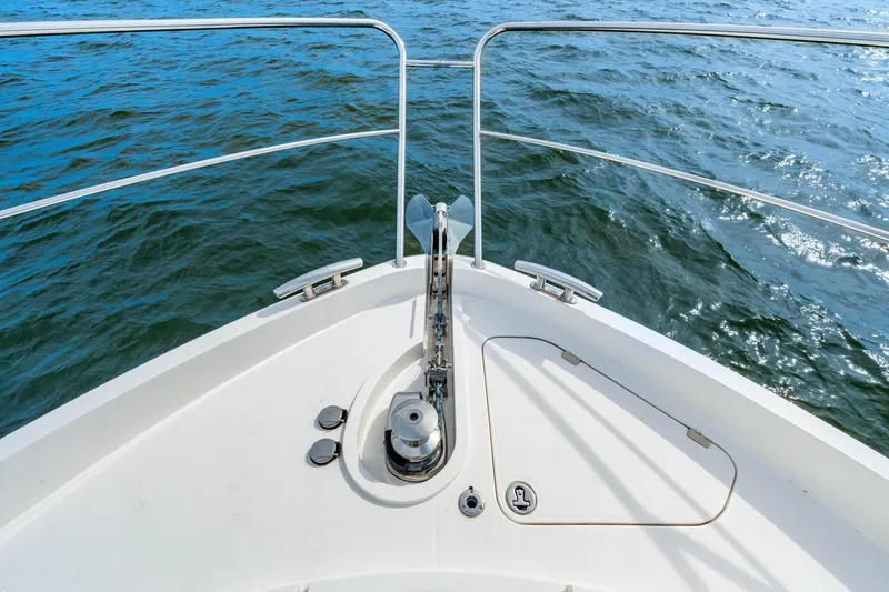 Slide: The Image of Bow of 2021 Sunseeker Manhattan 55 yacht on open water. - 39