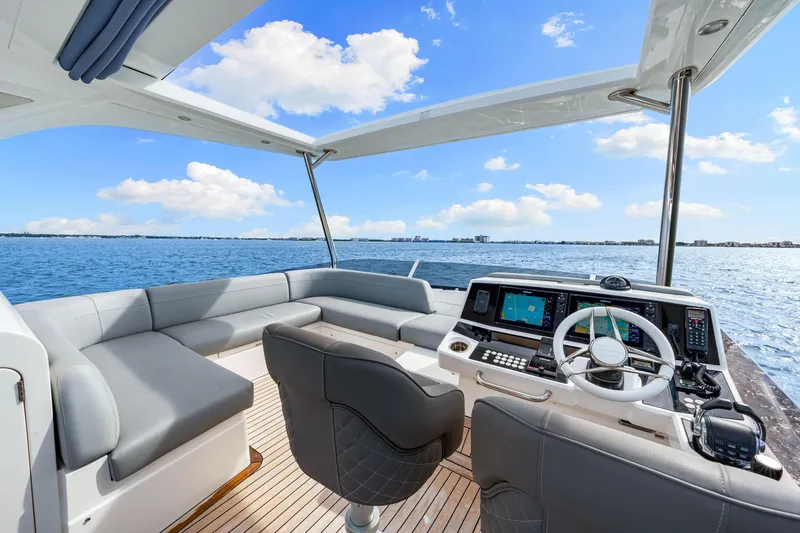 Slide: The Image of Luxurious Sunseeker Manhattan 55 yacht interior with modern helm and seating, 2021 model. - 43