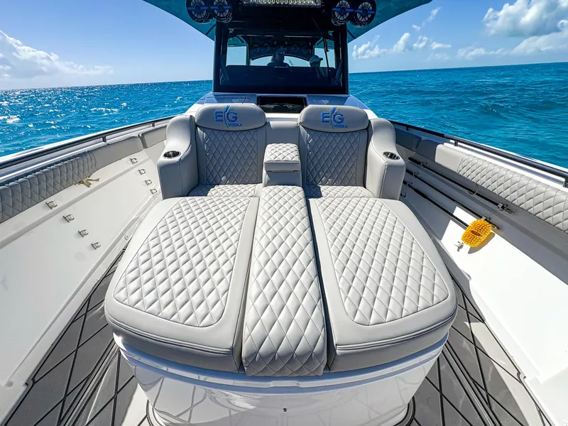 Slide: The Image of Luxurious seating on 2020 HCB 53 Sueños boat with ocean backdrop. - 28