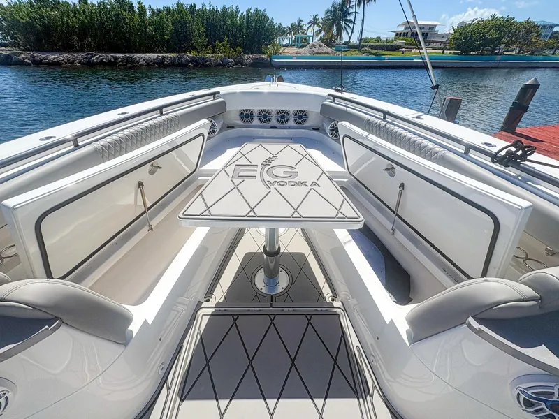 Slide: The Image of 2020 HCB 53 Sueños luxury boat interior with elegant seating and table. - 29