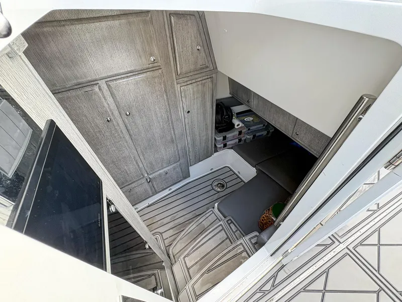 Slide: The Image of Interior cabin of 2020 HCB 53 Sueños boat with modern wood paneling. - 33