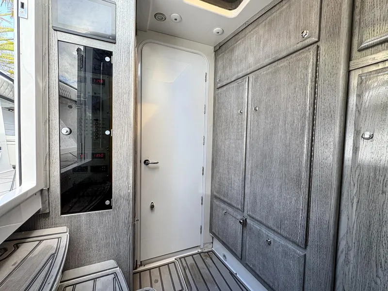 Slide: The Image of Interior of 2020 HCB 53 Sueños boat with sleek cabinetry and modern design. - 35