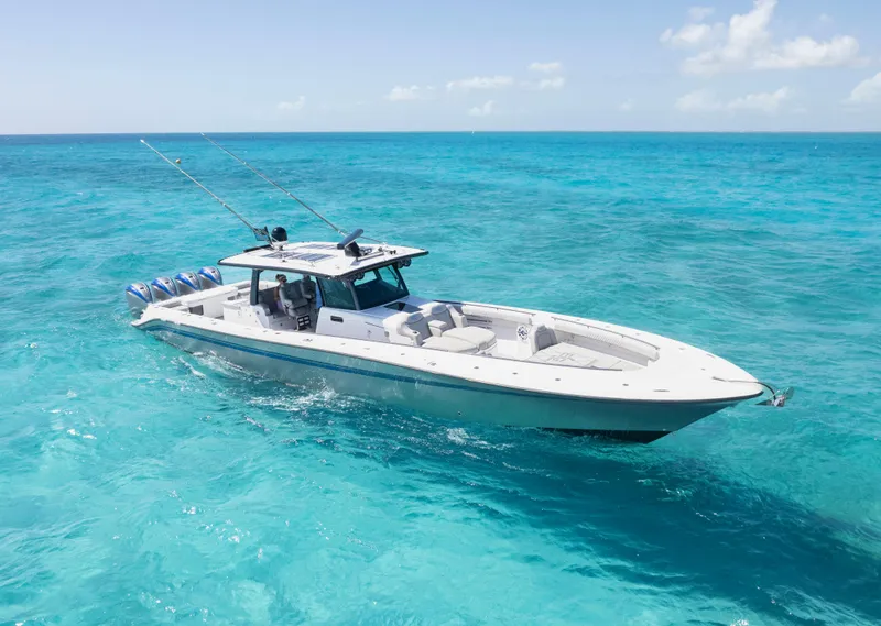 Slide: The Image of 2020 HCB 53 Sueños boat cruising on clear turquoise waters. - 48
