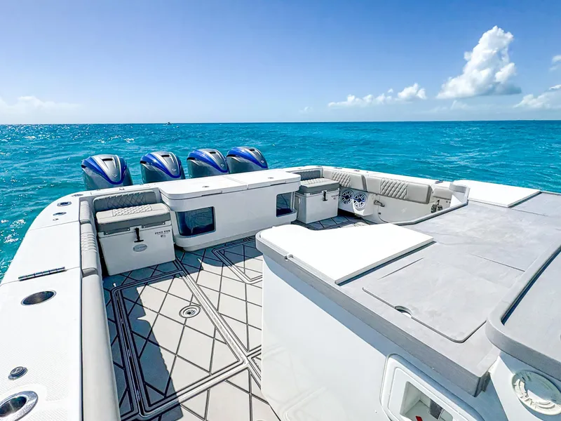 Slide: The Image of 2020 HCB 53 Sueños boat deck with ocean view and four engines. - 7