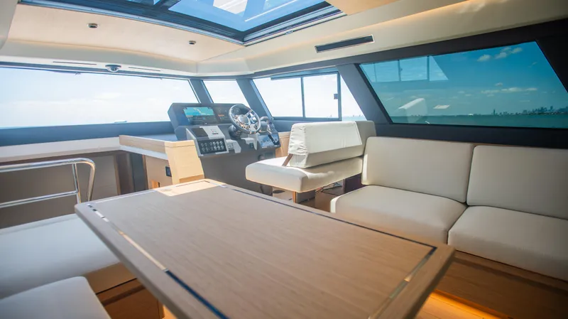 Slide: The Image of Luxurious interior of 2023 Pardo Yachts GT52 with modern seating and helm. - 18