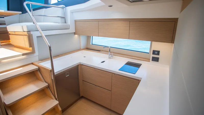 Slide: The Image of Modern kitchen interior of 2023 Pardo Yachts GT52 with sleek cabinetry and ocean view. - 23