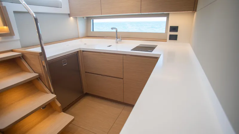 Slide: The Image of Modern kitchen interior of 2023 Pardo Yachts GT52 with sleek cabinetry and ocean view. - 25