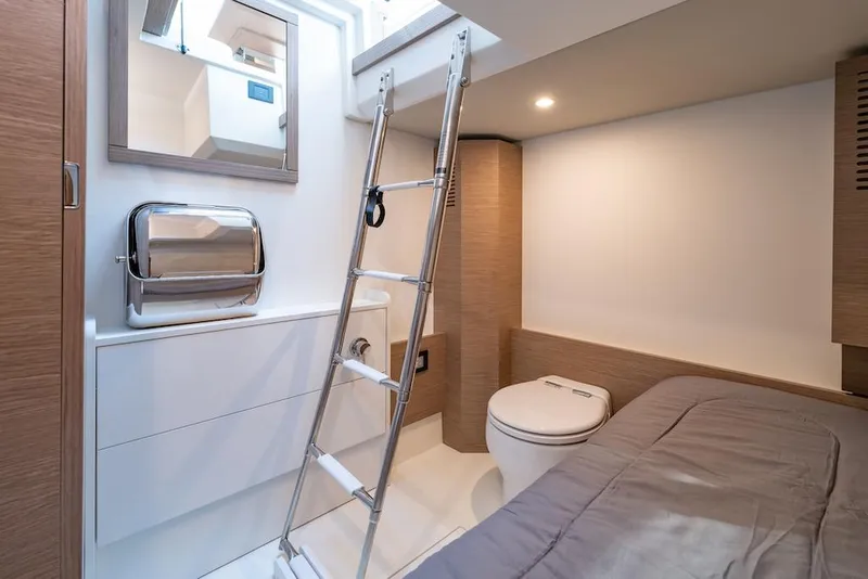 Slide: The Image of Modern bathroom interior of 2023 Pardo Yachts GT52 with sleek design and ladder access. - 33