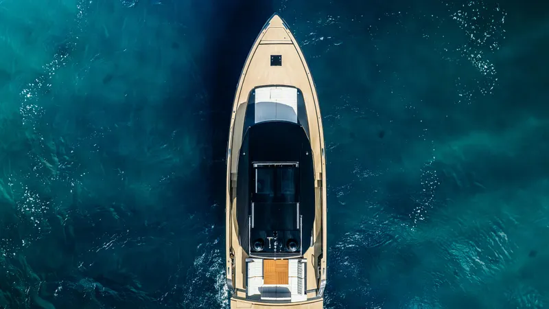 Slide: The Image of Aerial view of 2023 Pardo Yachts GT52 on deep blue water. - 14