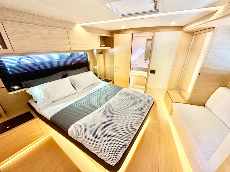Slide: The Image of Luxurious bedroom interior of 2023 Pardo Yachts GT52 with modern design and cozy ambiance. - 26