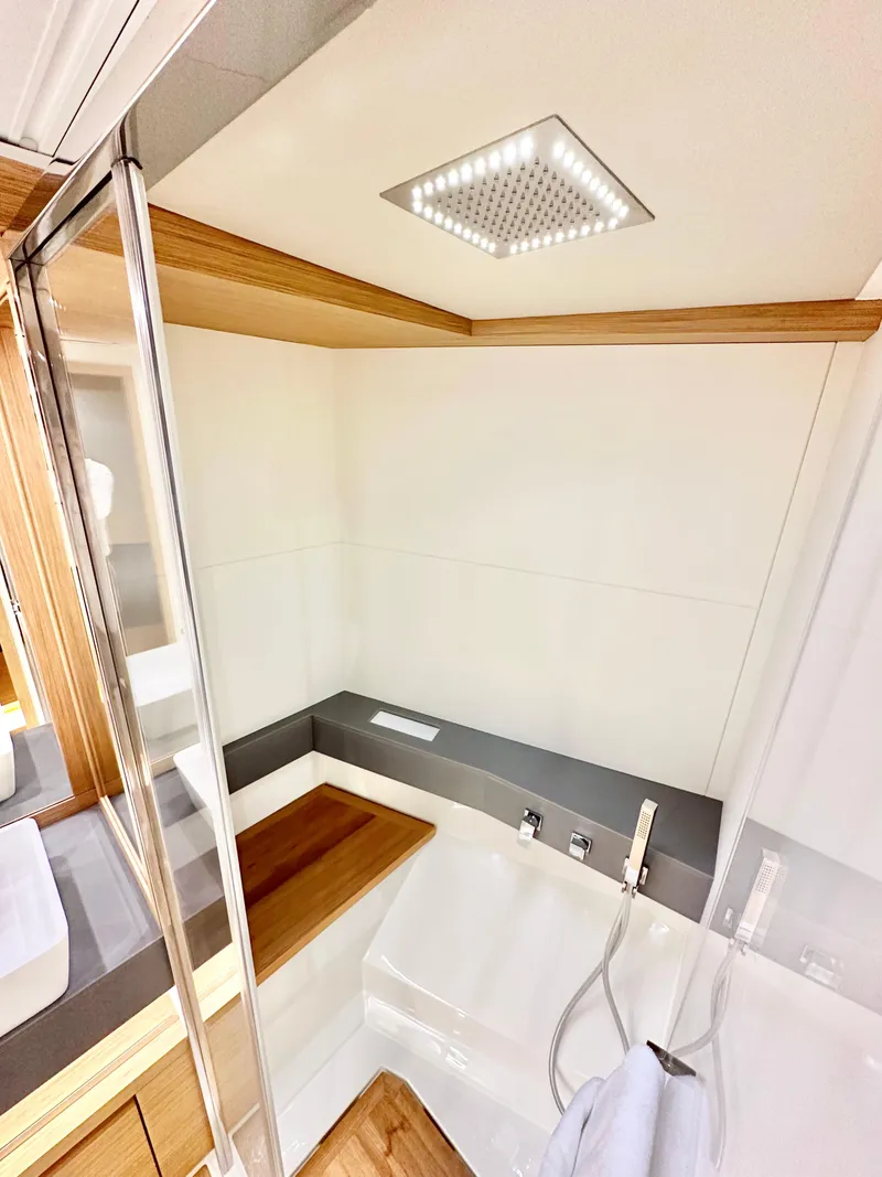 Slide: The Image of Luxurious bathroom interior of 2023 Pardo Yachts GT52 with modern fixtures and wood accents. - 29