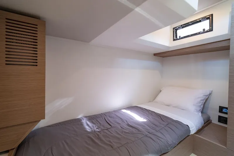 Slide: The Image of Cozy cabin interior of 2023 Pardo Yachts GT52 with single bed and modern design. - 34