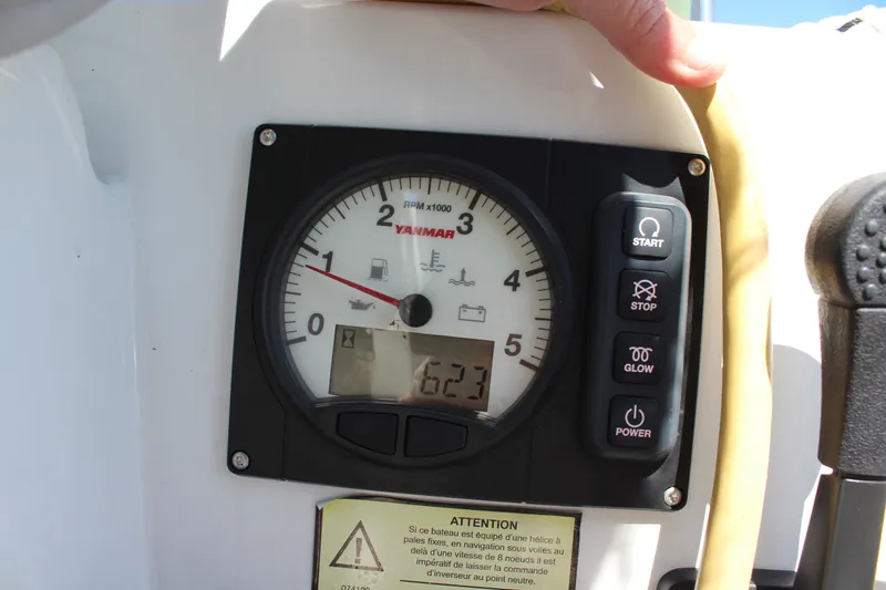 Slide: The Image of Control panel of a 2022 Beneteau Oceanis 30.1 sailboat with Yanmar engine display. - 36