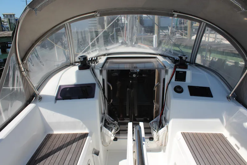 Slide: The Image of Beneteau Oceanis 30.1 cockpit, 2022 model, featuring modern design and navigation equipment. - 4