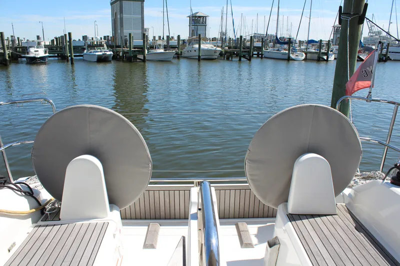 Slide: The Image of Beneteau Oceanis 30.1 yacht docked at marina, view from stern, 2022 model. - 5