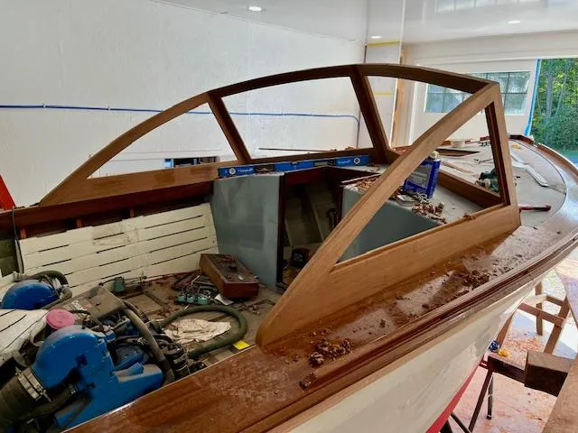 Slide: The Image of 2024 MacKenzie Cuttyhunk boat under construction in a workshop. - 43