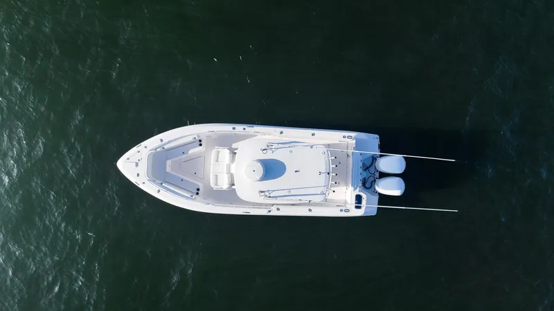 Slide: The Image of Aerial view of 2019 Everglades 295 Center Console boat on water. - 10