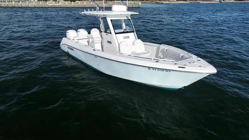 Slide: The Image of 2019 Everglades 295 Center Console boat on open water. - 11