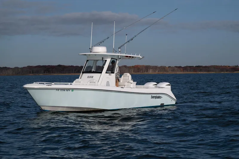 Slide: The Image of 2019 Everglades 295 Center Console boat on open water. - 16