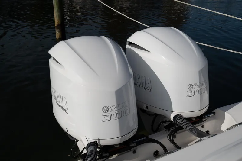 Slide: The Image of Twin Yamaha 300 outboard engines on 2019 Everglades 295 Center Console boat. - 32