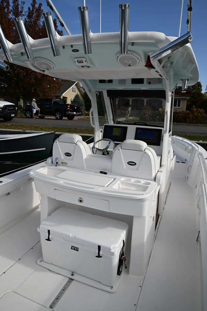 Slide: The Image of 2019 Everglades 295 Center Console boat with advanced navigation and fishing equipment. - 33