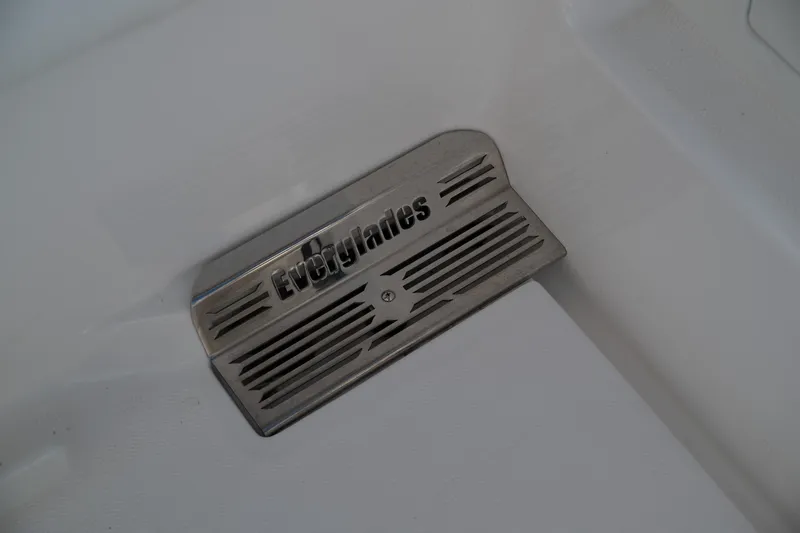 Slide: The Image of Everglades 295 Center Console 2019 metal nameplate on boat interior. - 42