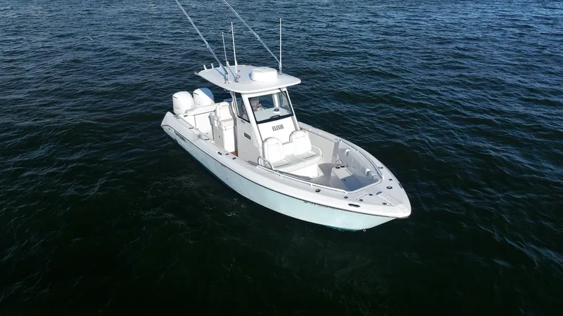Slide: The Image of 2019 Everglades 295 Center Console boat on open water. - 8