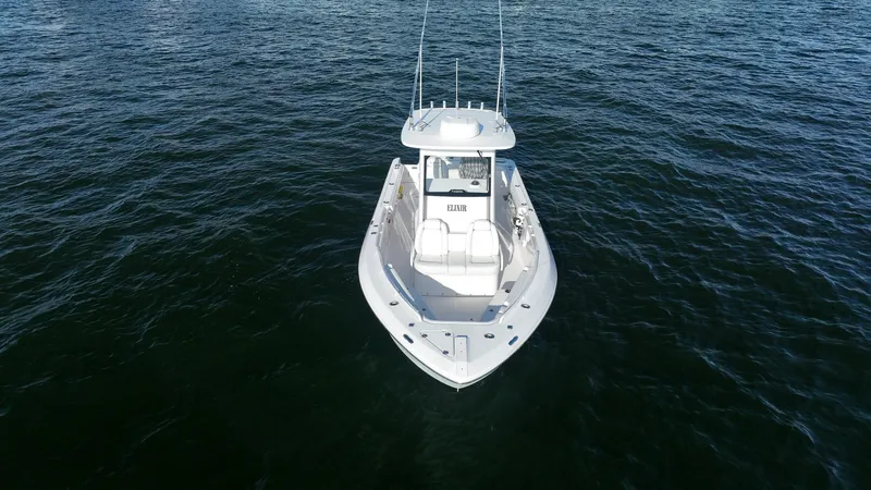 Slide: The Image of 2019 Everglades 295 Center Console boat on open water. - 9