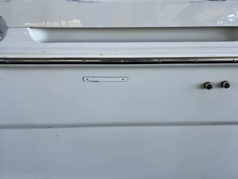 Slide: The Image of Close-up of 2001 Carver 450 Voyager Pilothouse boat hull with identification plate. - 13