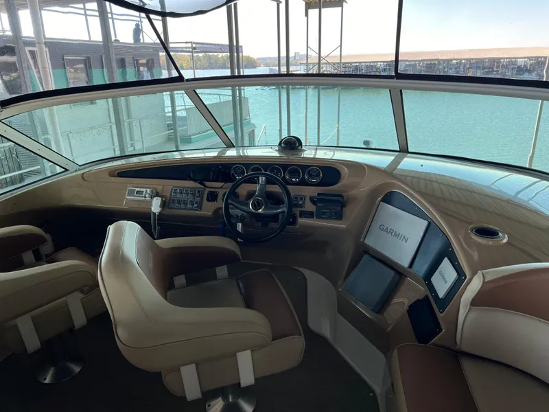 Slide: The Image of Interior of 2001 Carver 450 Voyager Pilothouse with Garmin navigation system. - 28