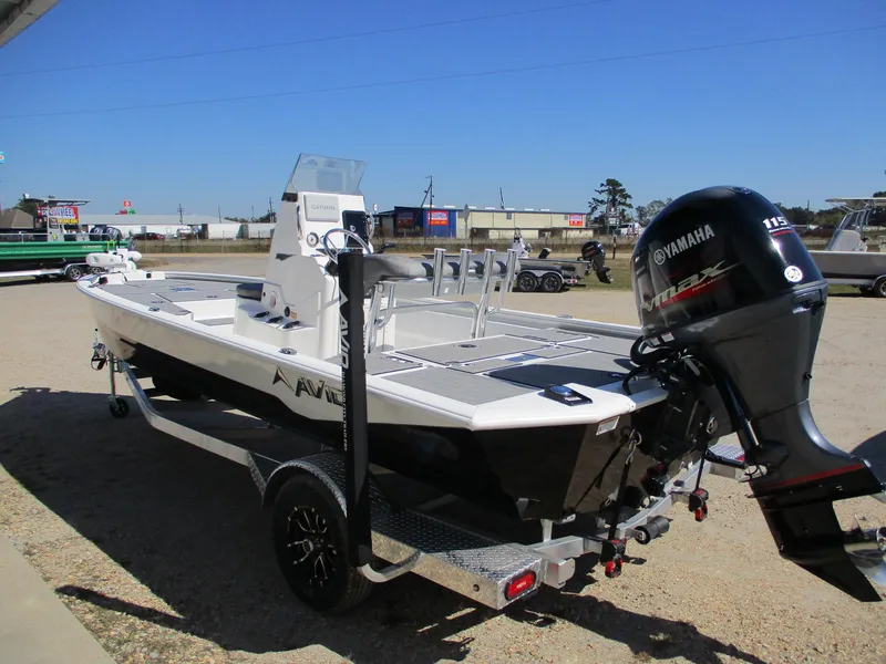 Slide: The Image of 2025 Avid 21 FSX boat with Yamaha outboard motor on trailer. - 5