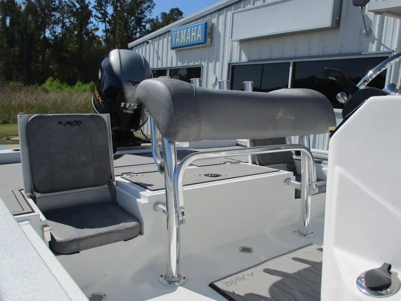 Slide: The Image of 2025 Avid 21 FSX boat interior with Yamaha engine, featuring seating and console. - 8