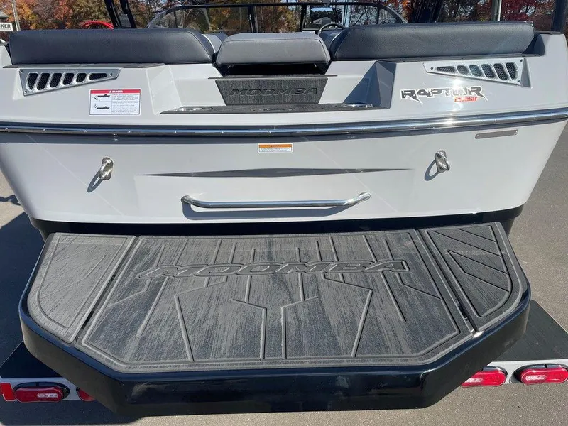 Slide: The Image of 2025 Moomba Mondo boat rear view with Raptor engine branding. - 12