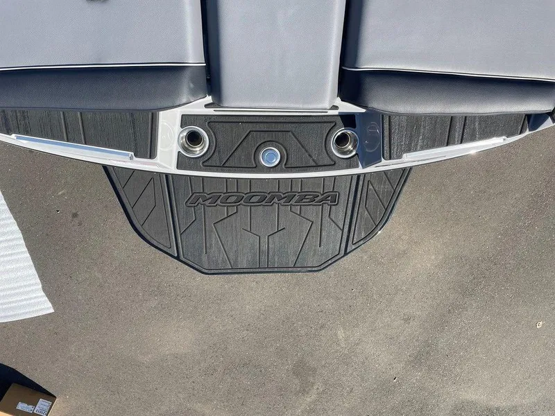 Slide: The Image of 2025 Moomba Mondo boat swim platform with logo and cup holders. - 13