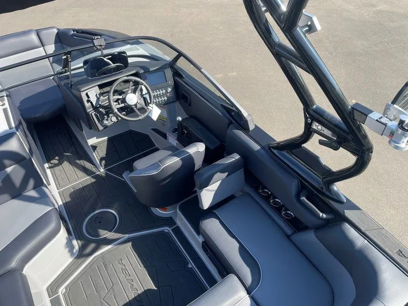 Slide: The Image of 2025 Moomba Mondo boat interior with sleek design and modern dashboard features. - 15