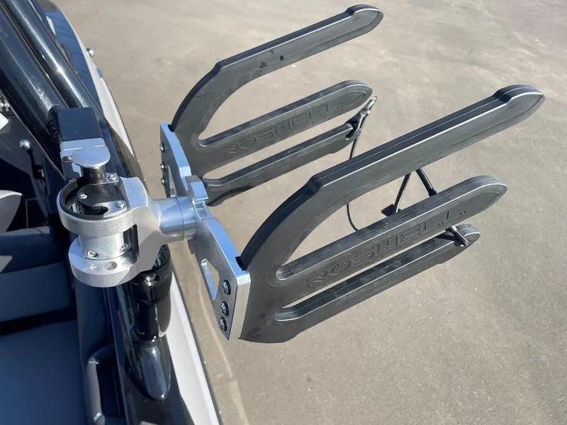 Slide: The Image of 2025 Moomba Mondo boat wakeboard rack, mounted on a sleek black frame. - 20